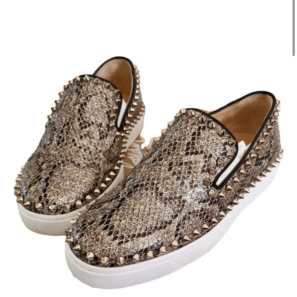 Christian Louboutin
Studded Snake Print Slip-On Sneakers